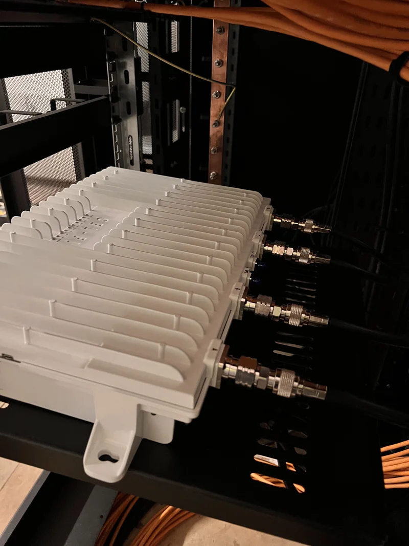 a photograph of a rack of cables and wires in a rack