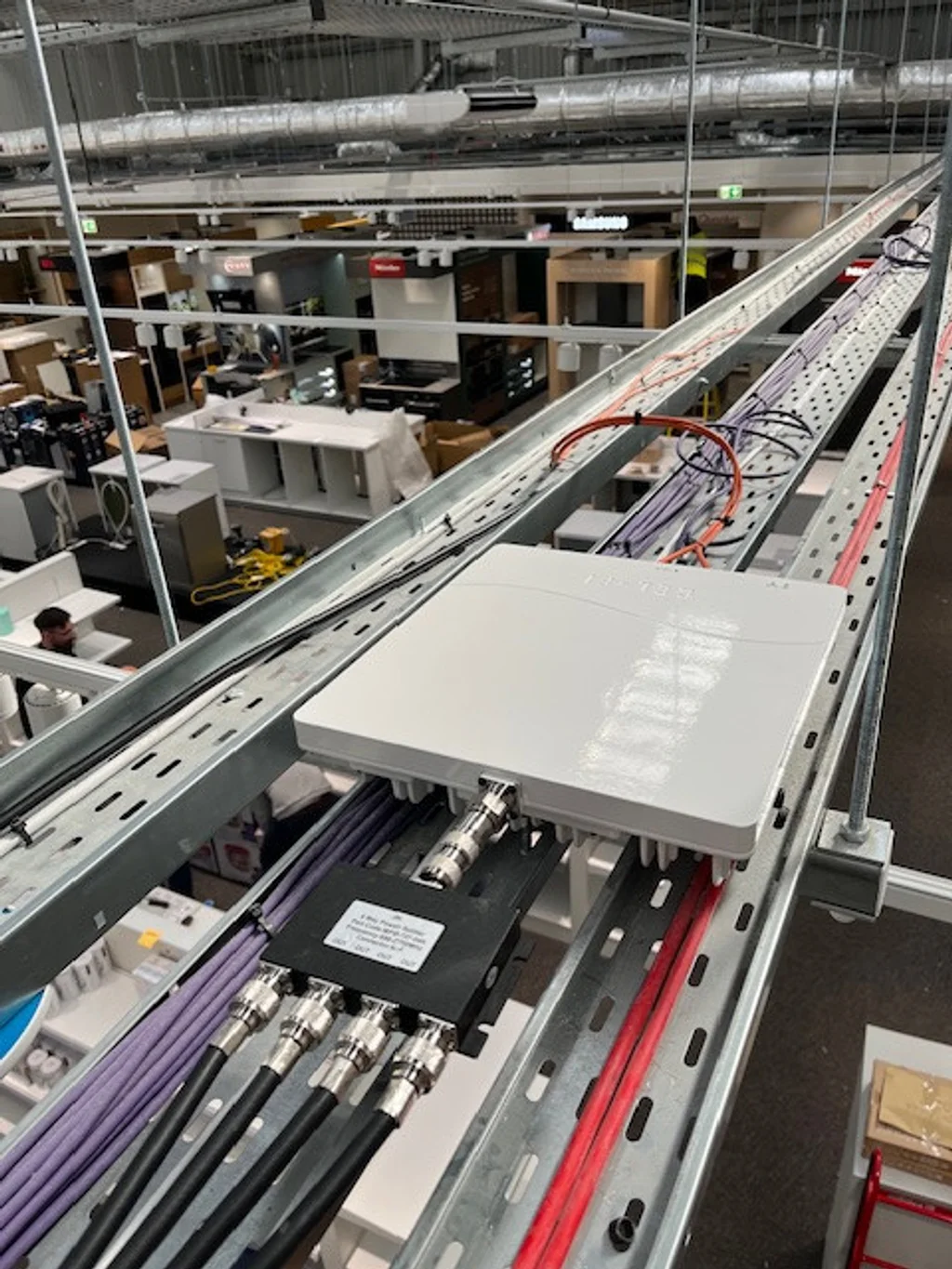 a photograph of a factory floor plan with a conveyor belt