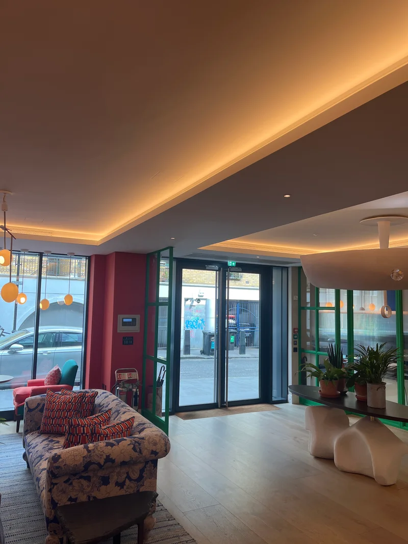 a photograph of a living room with a couch and a couch