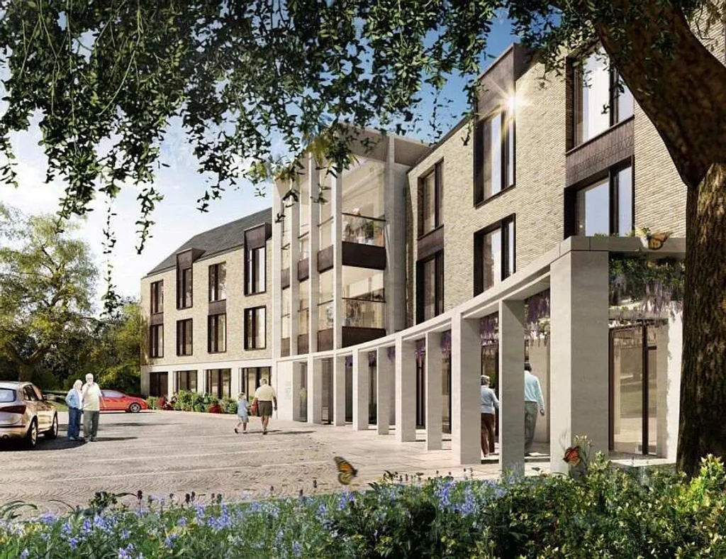 a photograph of a group of people walking around a courtyard